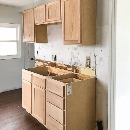 Kitchen cabinets and stripped surfaces during a small remodel