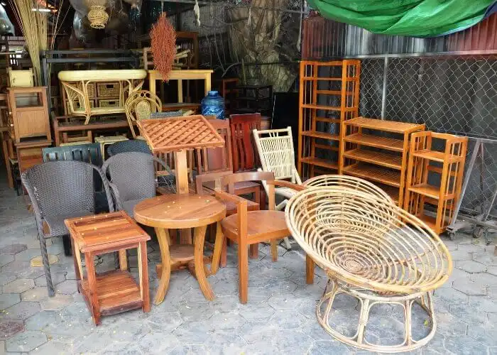 An assortment of wooden chairs and household furniture