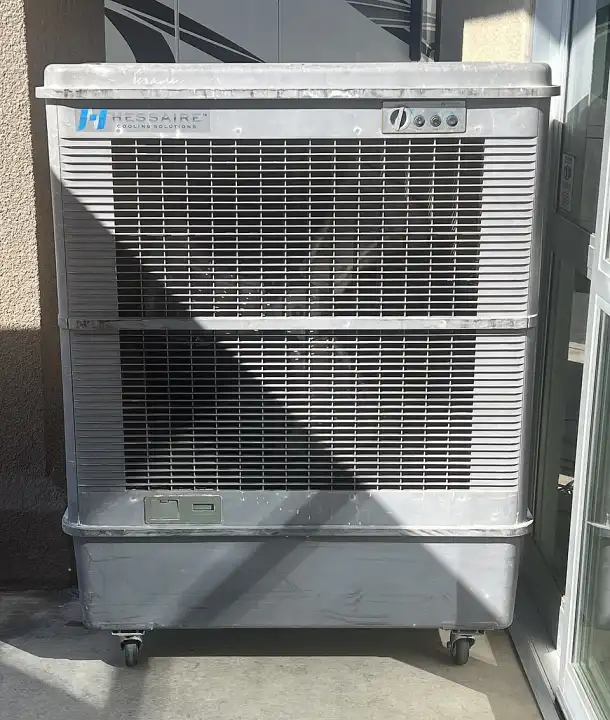 A portable evaporative swamp cooler